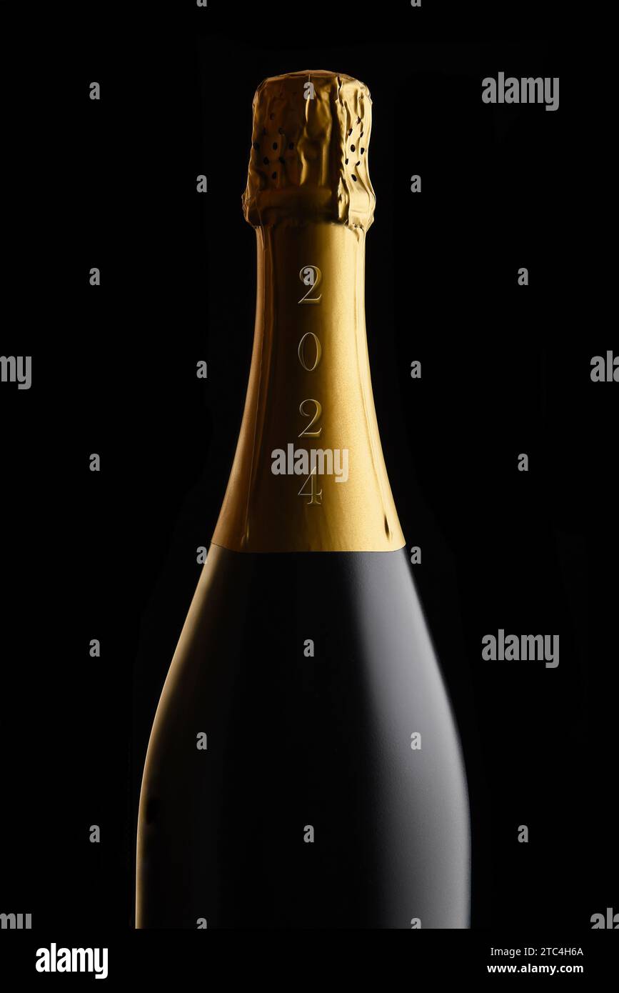 New Years Concept. Closeup of an unopened bottle of Champagne with the