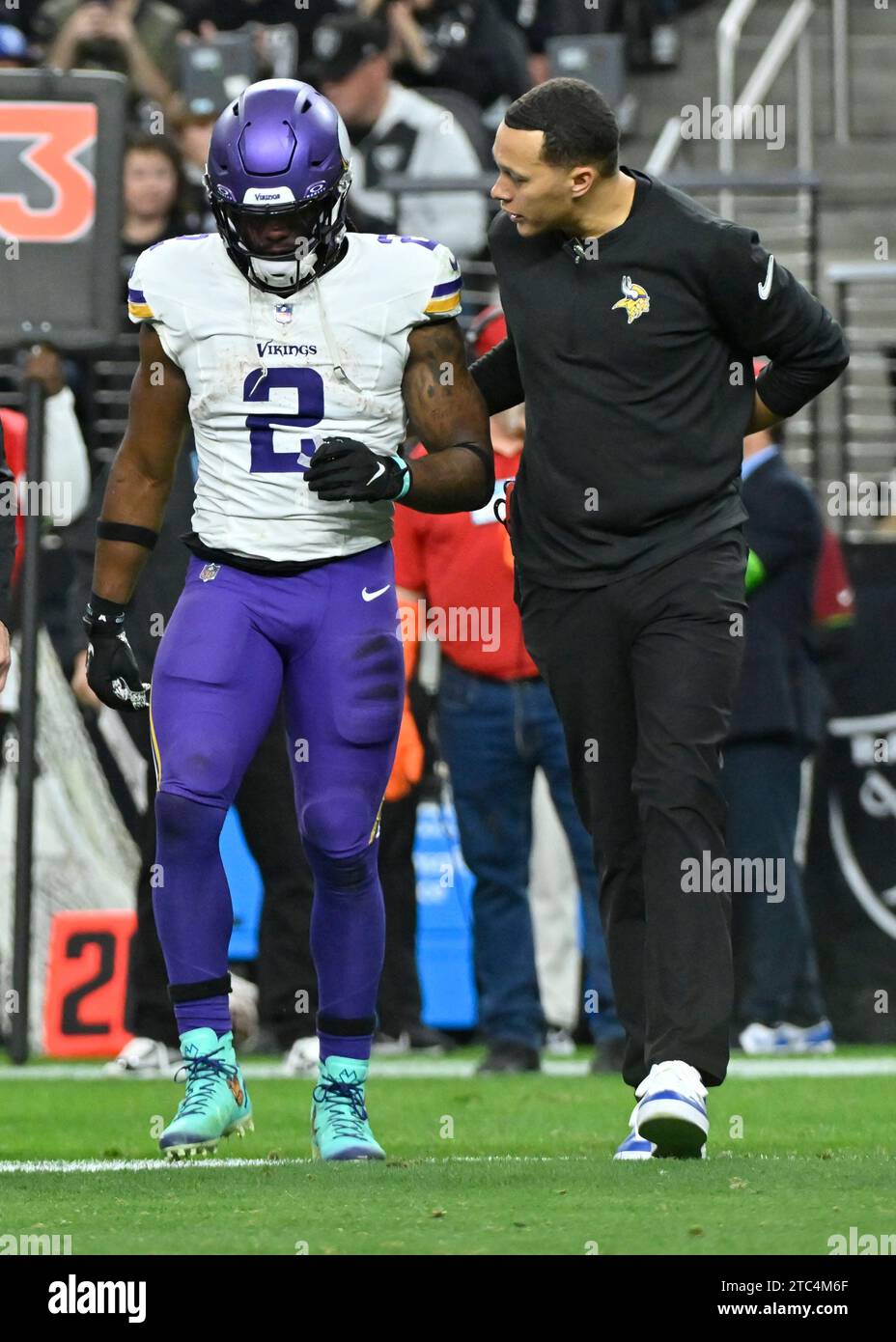 Minnesota Vikings running back Alexander Mattison (2) is helped off the field during the second