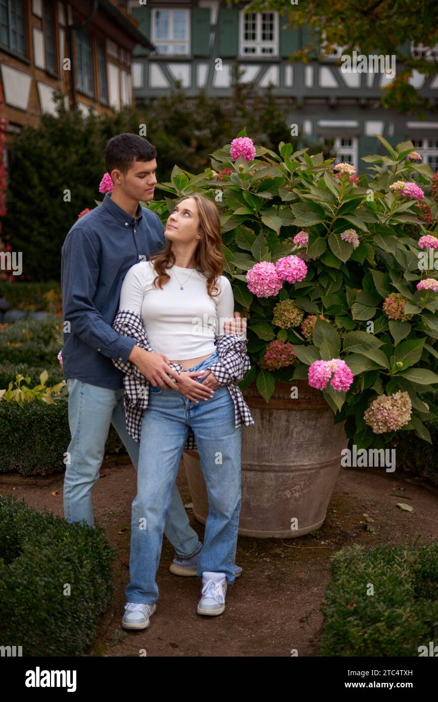 Teenage couple hugging in park hi-res stock photography and images - Alamy