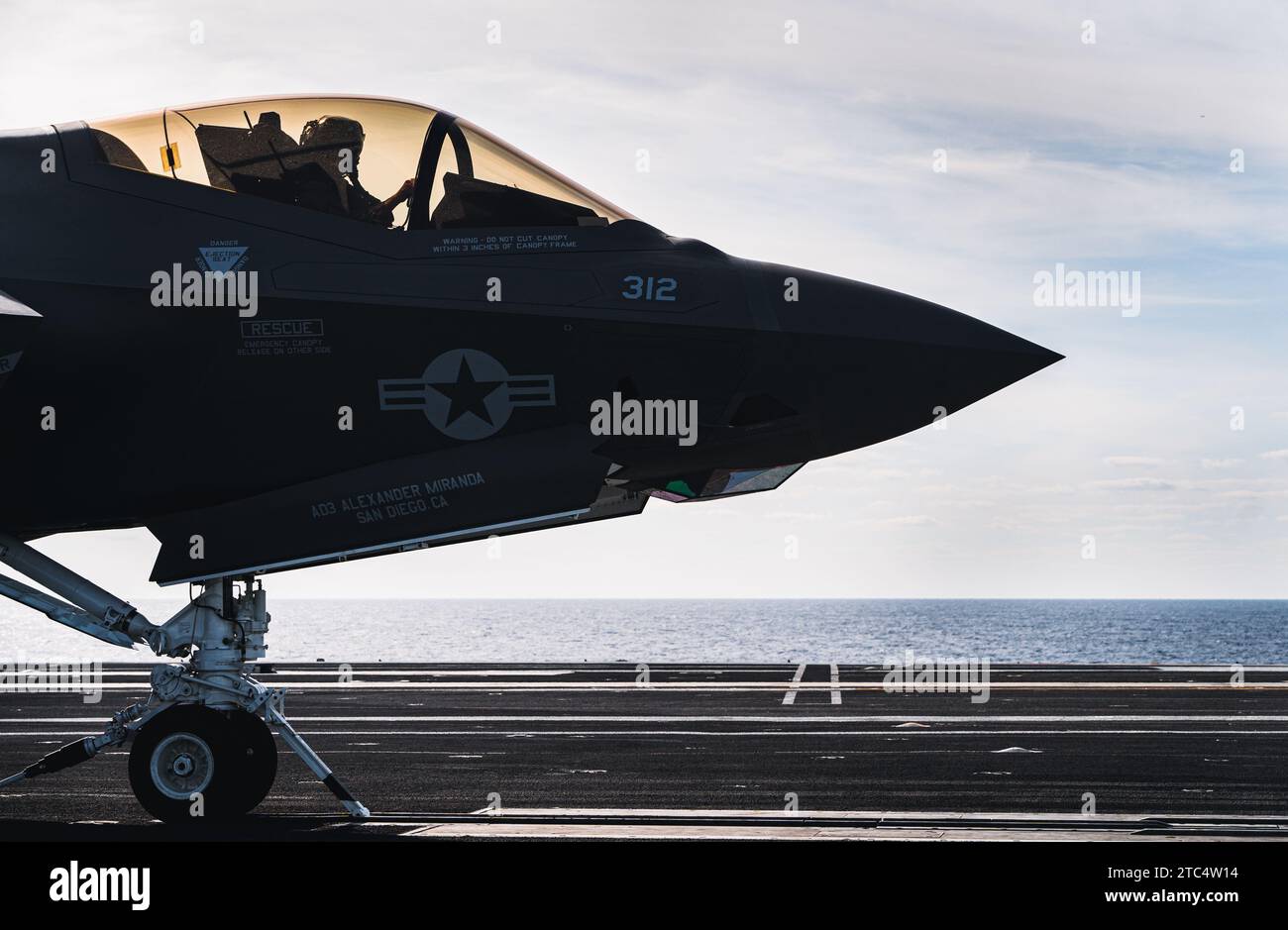 An F-35C Lightning II assigned to Strike Fighter Squadron (VFA) 147, prepares to hook into the catapult on Nimitz-class aircraft carrier USS George Washington (CVN 73), Dec. 8, 2023. George Washington is underway in support of future operations. (U.S. Navy photo by Mass Communication Specialist 3rd Class August Clawson) Stock Photo