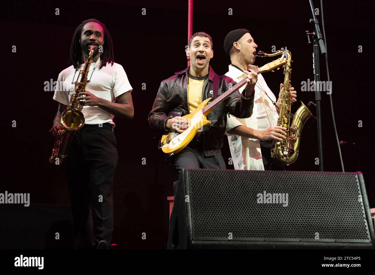 Zem Audu, left, Jack Antonoff, and Evan Smith of Bleachers perform during KROQ Almost Acoustic