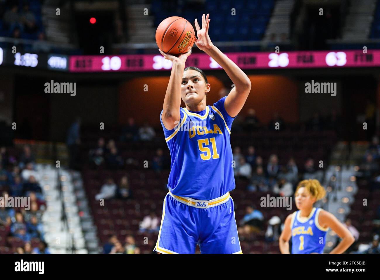 Uncasville, CT, USA. 10th Dec, 2023. UCLA Bruins center Lauren Betts (51) shoots a free throw during an NCAA women's basketball game in the Invesco QQQ Basketball Hall of Fame Women's Showcase between the Florida State Seminoles and the UCLA Bruins at Mohegan Sun Arena in Uncasville, CT. Erica Denhoff/CSM/Alamy Live News Stock Photo