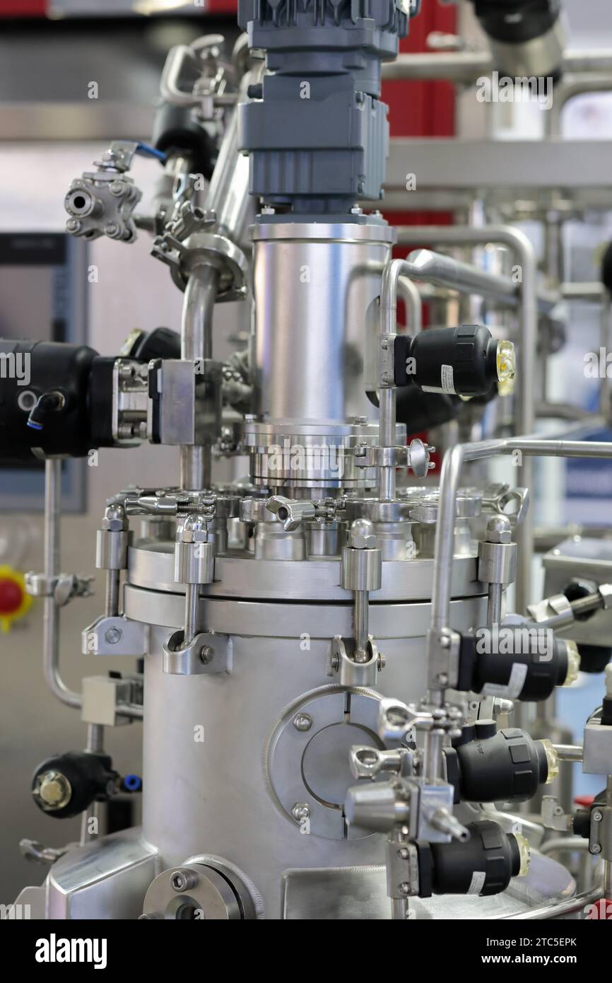 Chemical industrial stainless steel high pressure mixing reactor. Selective focus. Stock Photo