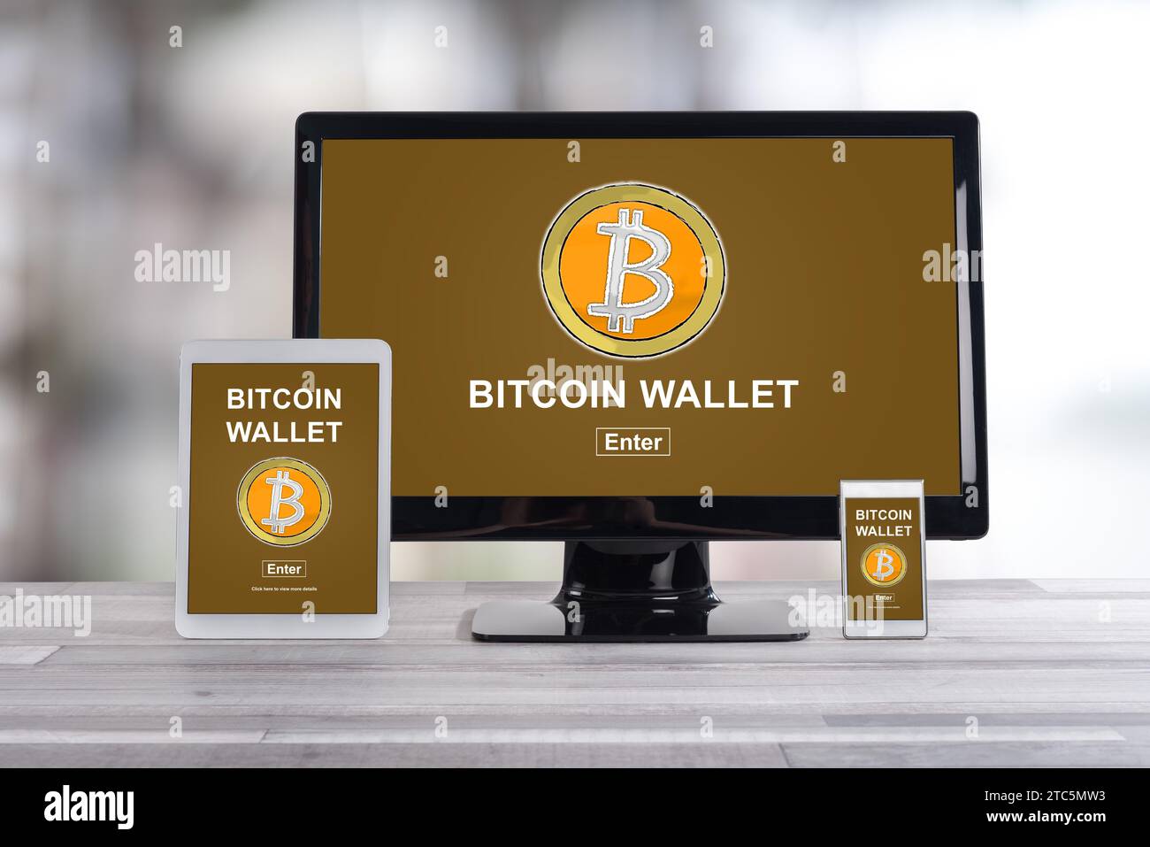 Bitcoin wallet concept shown on different information technology devices Stock Photo
