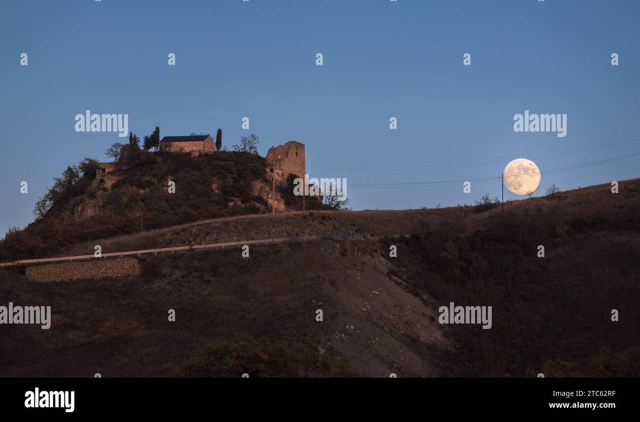 The castle, the full moon and the inclined plane. Stock Photo