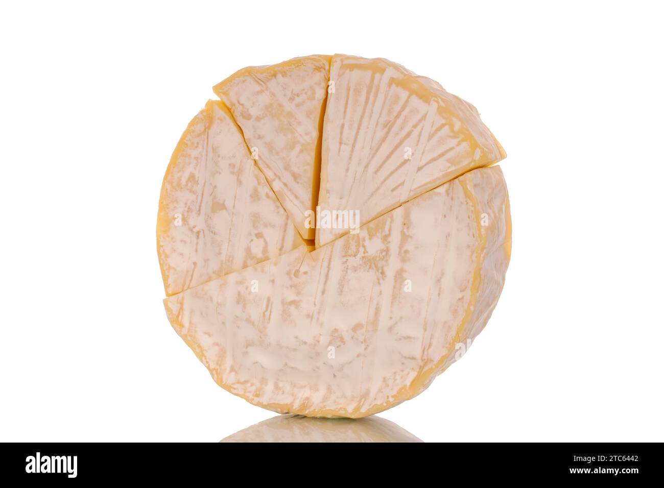 Fragrant Brie cheese, macro, isolated on white background Stock Photo