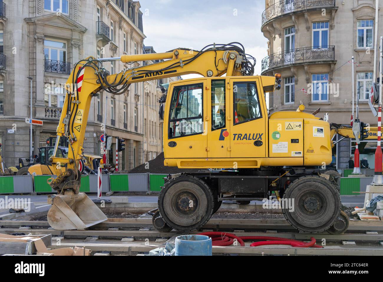 Luxembourg City, Luxembourg - Yellow road-rail wheeled excavator Atlas 1404 MZ on construction site. Stock Photo