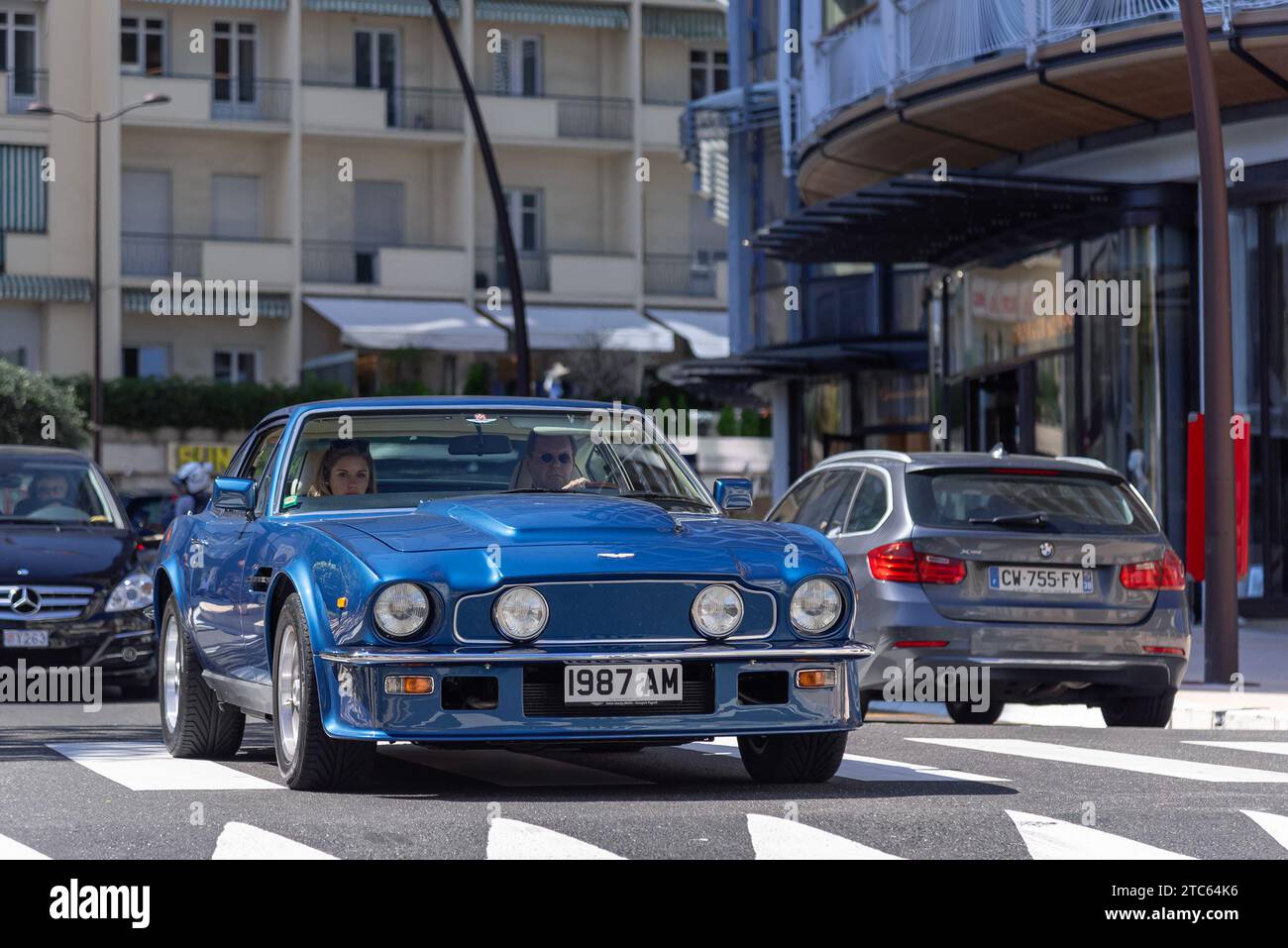 Monaco, Monaco - Blue Aston Martin V8 Vantage driving on the road. Stock Photo