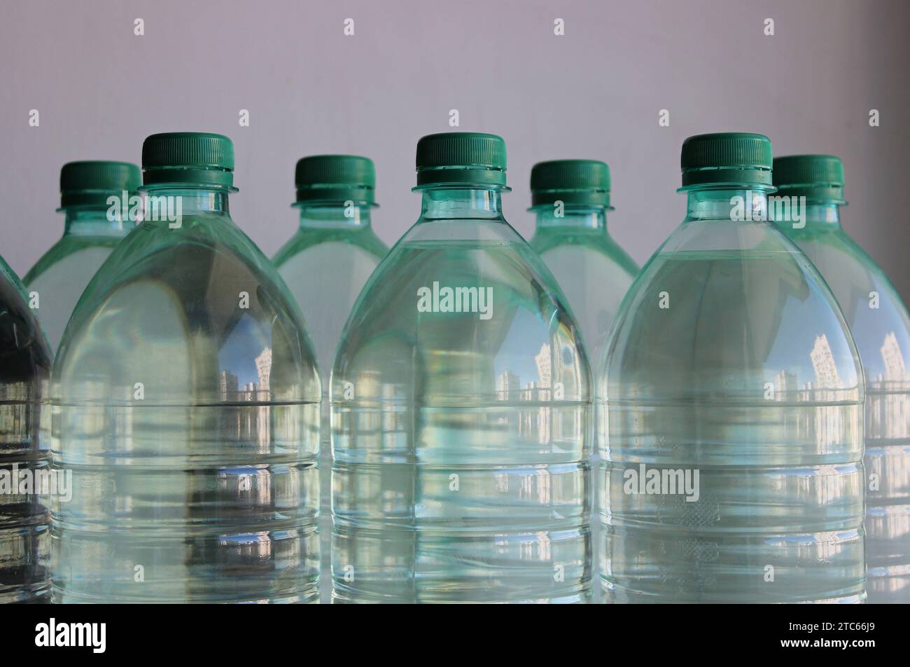 Same plastic bottles with clean water on white background isolated Stock Photo Alamy