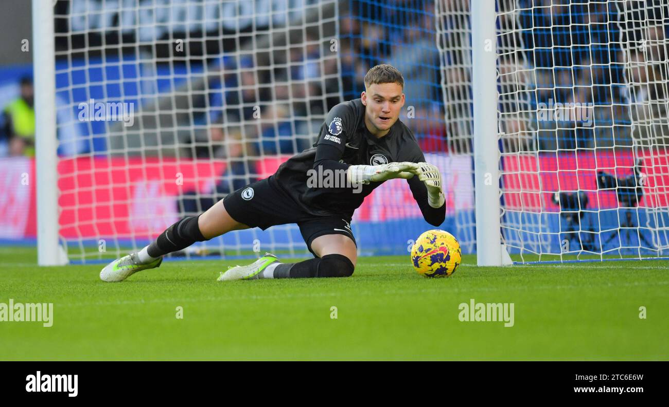 Bart Verbruggen of Brighton makes a save during the Premier League match between Brighton and Hove Albion and Burnley at the American Express Stadium  , Brighton , UK - 9th December 2023 Photo Simon Dack / Telephoto Images Editorial use only. No merchandising. For Football images FA and Premier League restrictions apply inc. no internet/mobile usage without FAPL license - for details contact Football Dataco Stock Photo