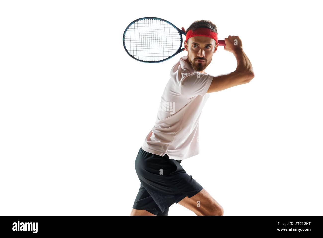 Serious and concentrated young man, tennis player during game, standing ...