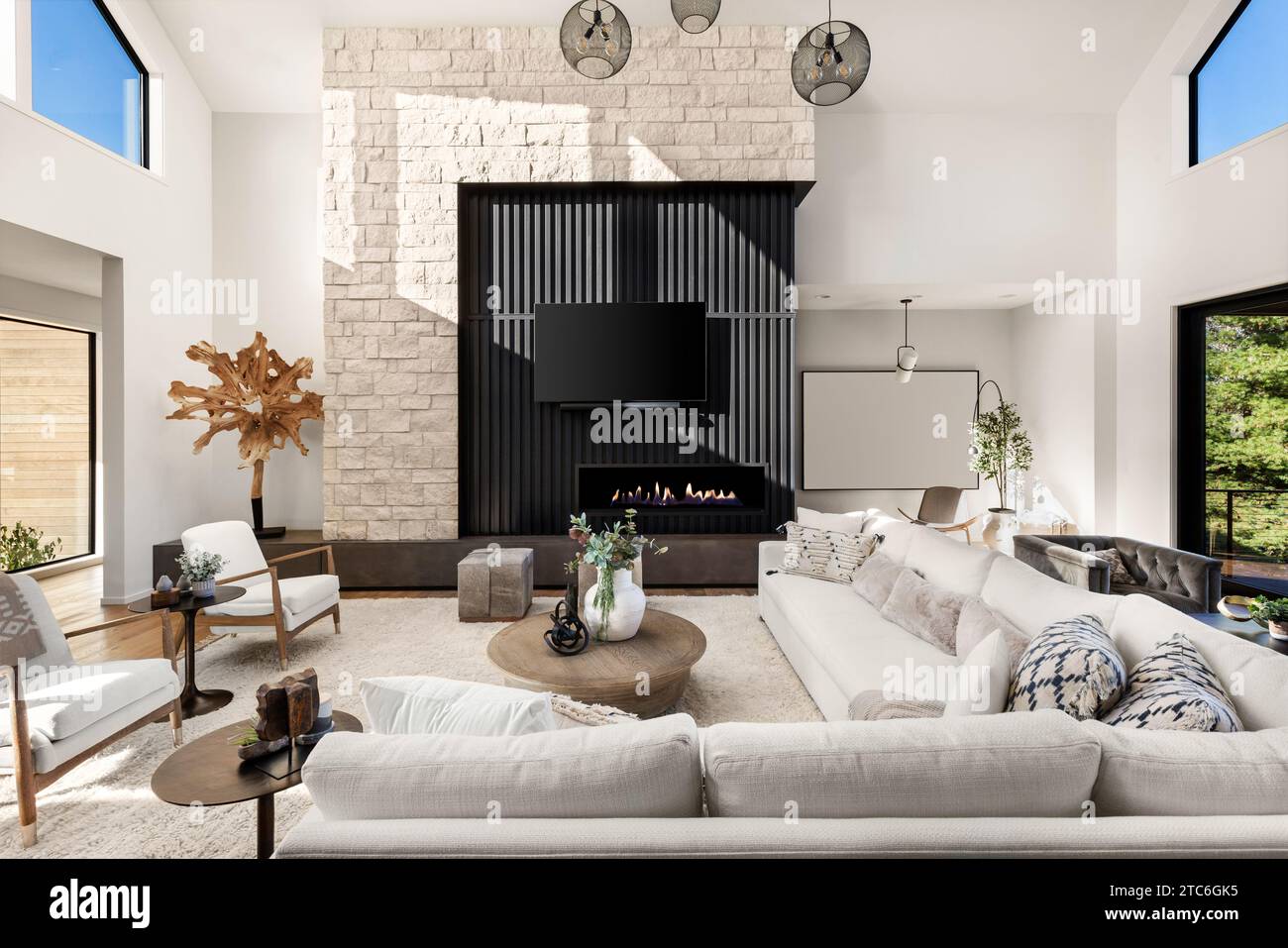 View of Living room in contemporary style luxury home with vaulted ceilings ...