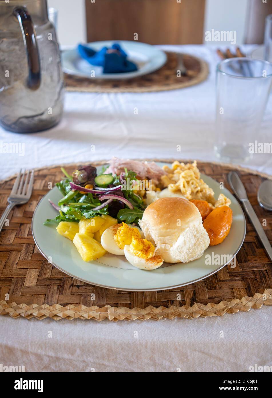 Colorful plate of food featuring traditional Thanksgiving foods Stock Photo