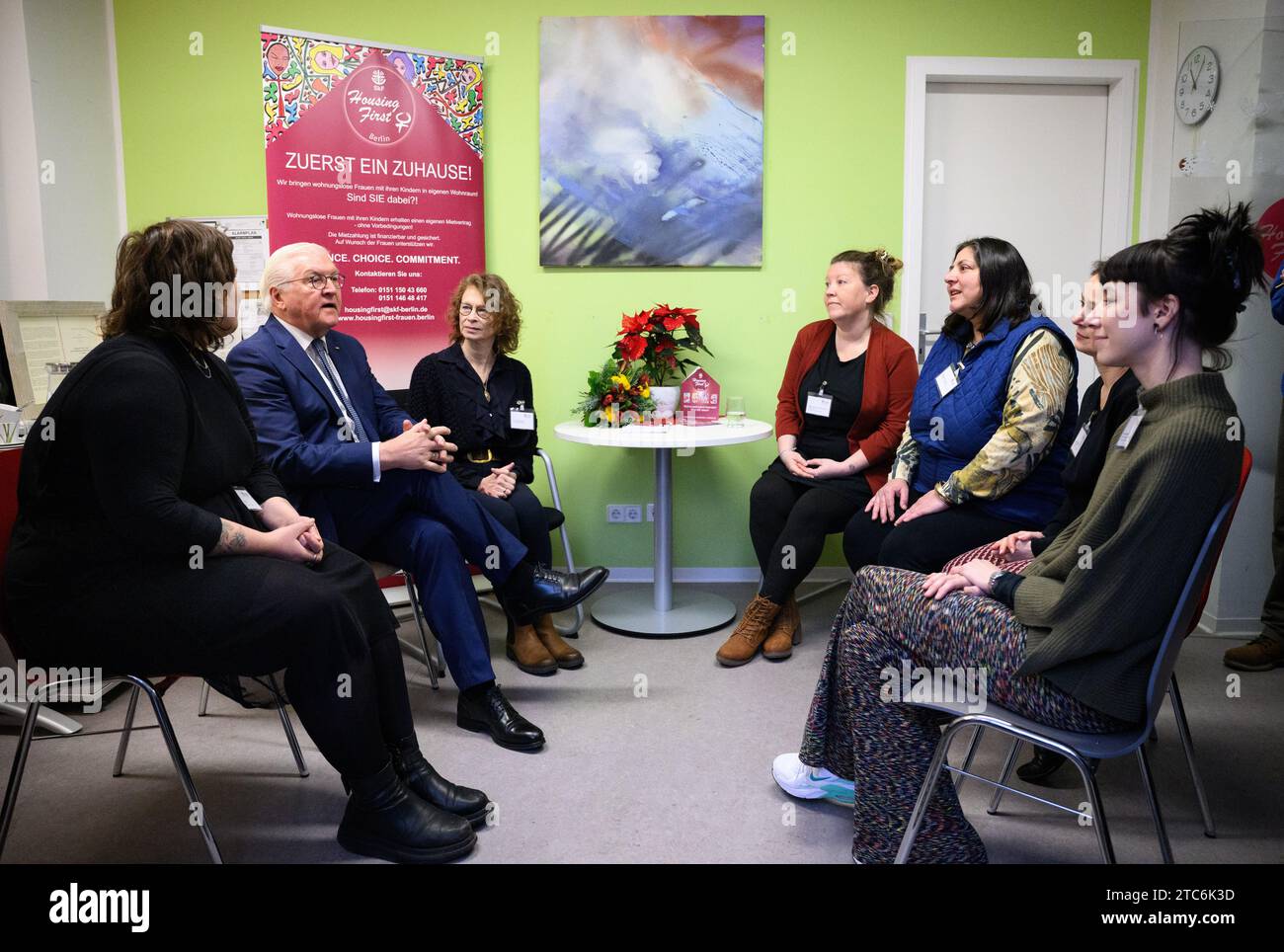 Berlin, Germany. 11th Dec, 2023. Federal President Frank-Walter Steinmeier (2nd from left) visits the support facilities for women 'Housing First' and 'Eva's Haltestelle' of the Sozialdienst katholischer Frauen e.V. in Berlin-Wedding and talks to employees and participants of the 'Housing First' project. Credit: Bernd von Jutrczenka/dpa/Alamy Live News Stock Photo