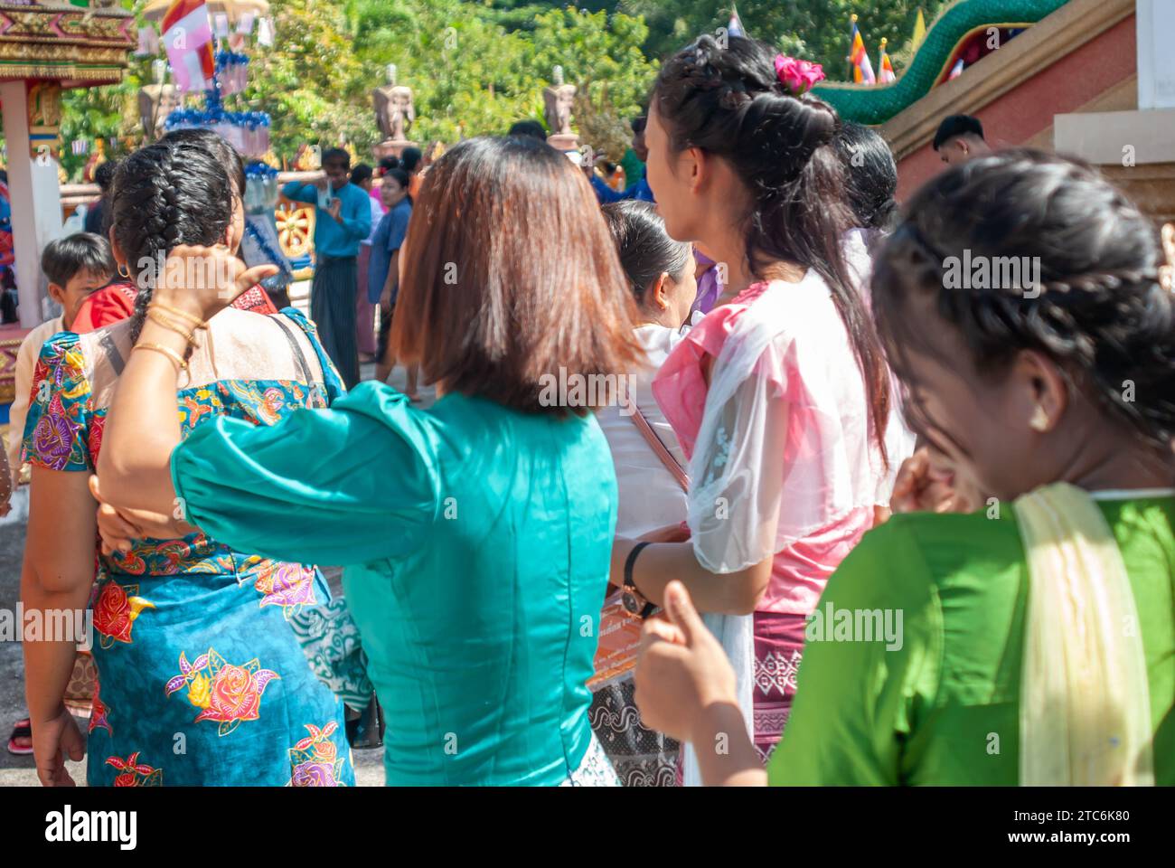 SURATTANI, THAILAND- NOV. 06, 2023: Burmese people dress in national clothes, Came out during the Kathin merit-making festival of our Burmese brothers Stock Photo