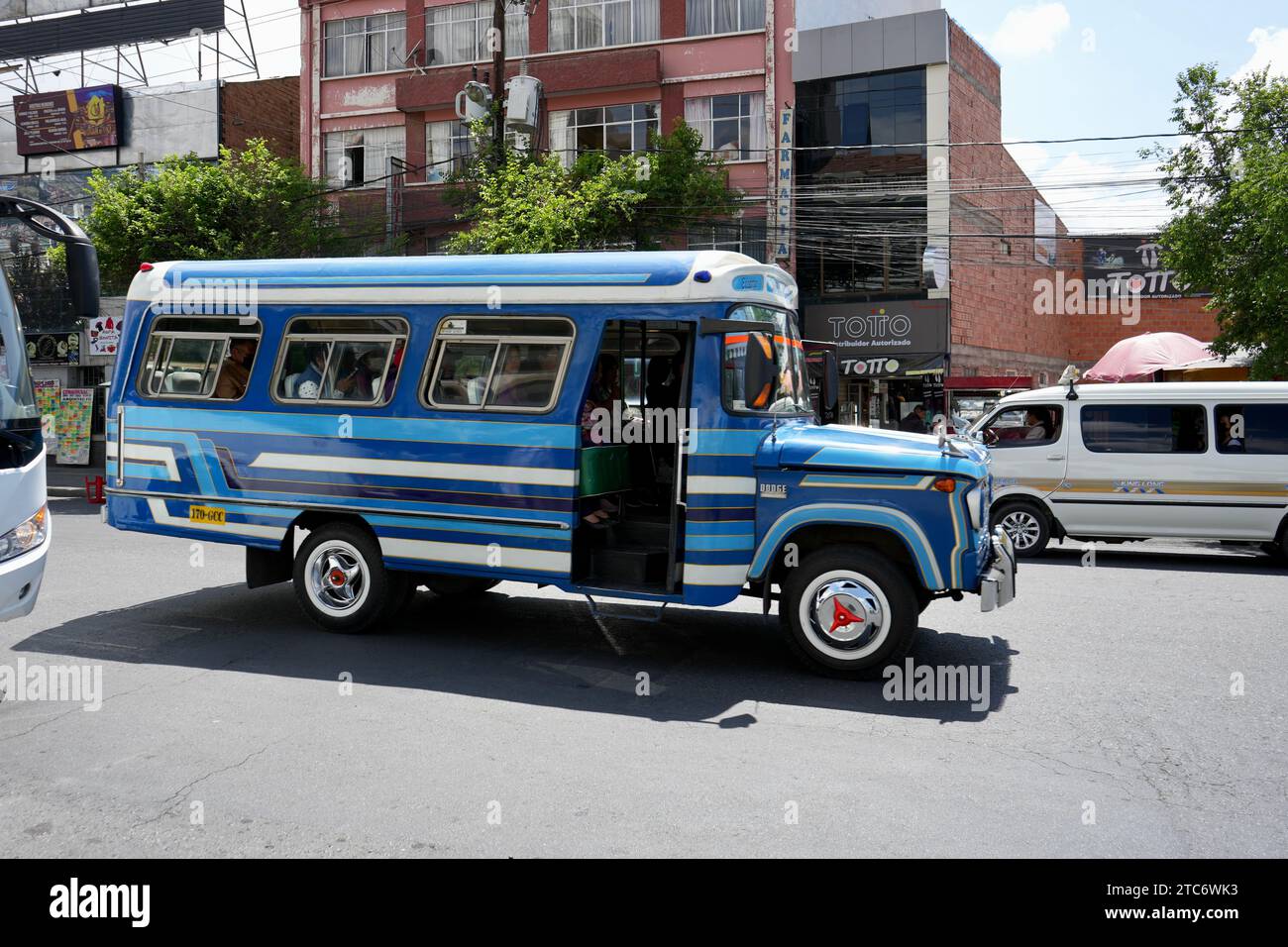 Bright Blue Striped Dodge Passenger bus. La Paz, Bolivia, October 10, 2023. Stock Photo