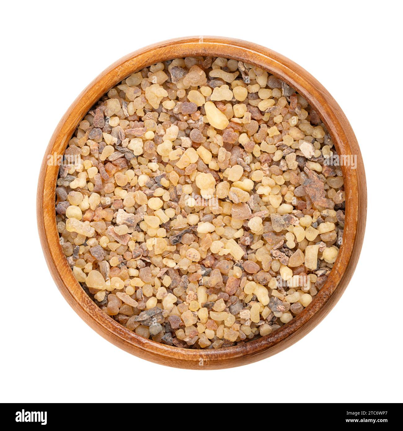 Frankincense and myrrh resin in a wooden bowl. Mixture of hardened resin of the genus Boswellia and of Commiphora myrrha. Stock Photo