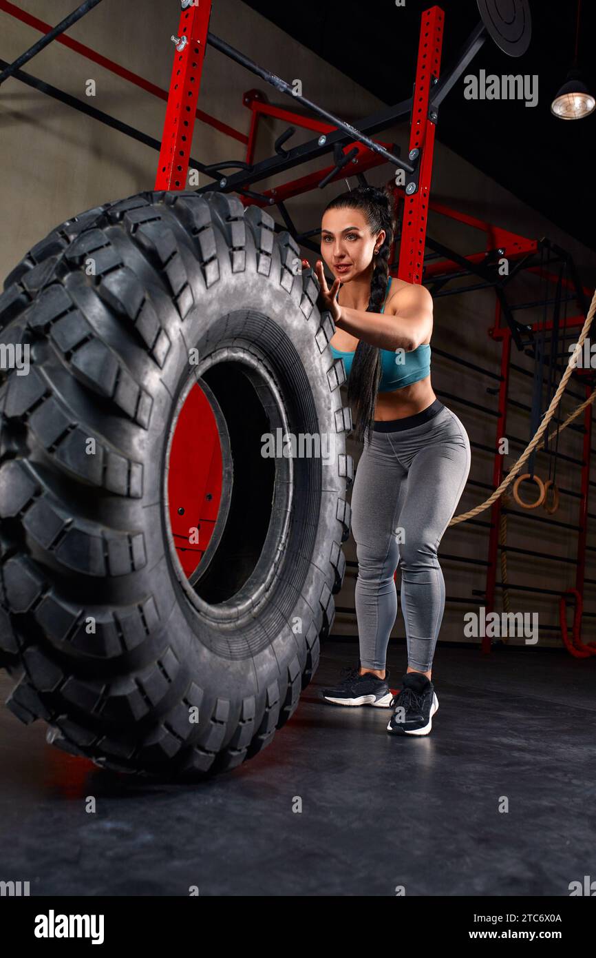 Woman flipping tire in crossfit hi res stock photography and images Alamy