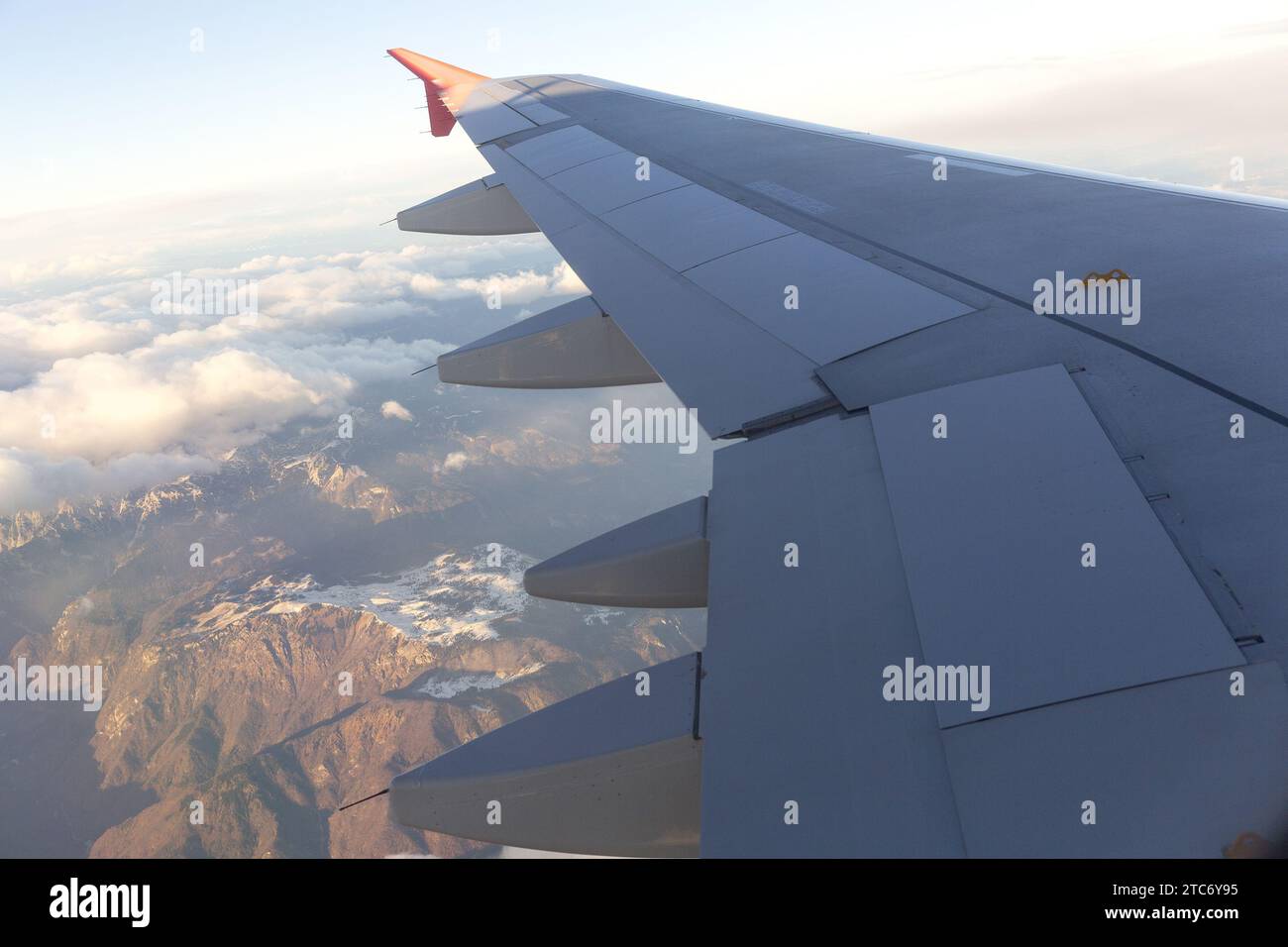 Airplane wing during flight Stock Photo