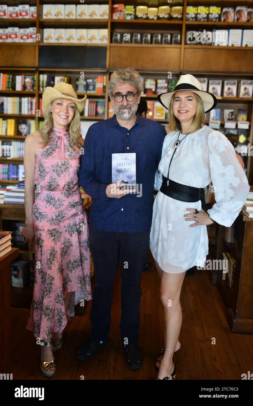 CORAL GABLES, FLORIDA - DECEMBER 10: Shannon Pastuszak, Mitchell Kaplan and Christy Cashman pose for picture during A morning Brunch with Author Christy Cashman in conversation with Mitchell Kaplan about Christy Cashman book 'The Truth about Horses' at Books and Books-Gables on December 10, 2023 in Coral Gables, Florida. Credit: MPI10 / MediaPunch Stock Photo