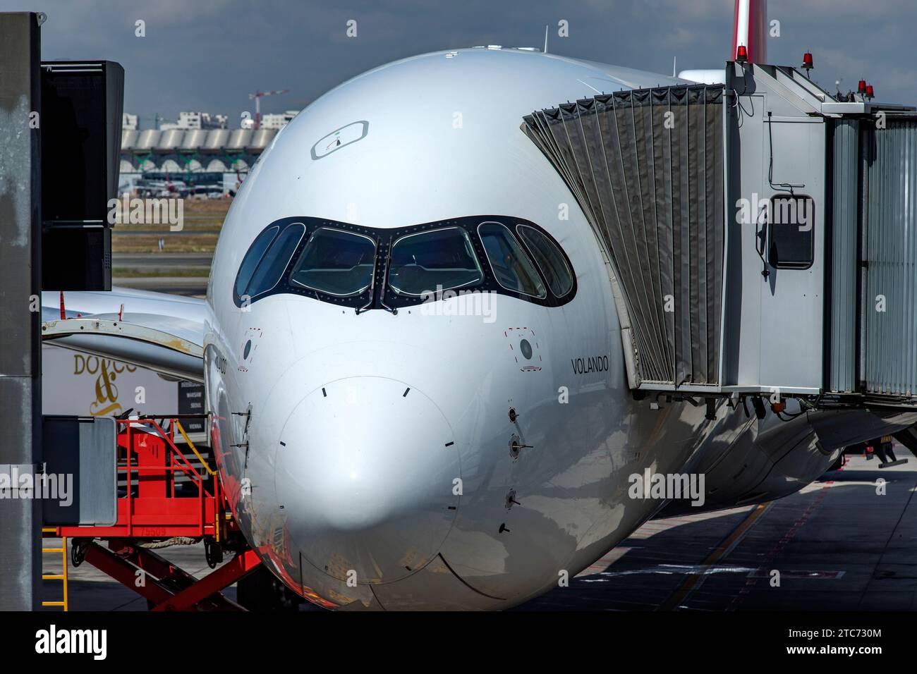 Madrid, Spain; May 31, 2023: Photo of the Airbus A350-900, a new-generation wide-body aircraft of Spanish airline Iberia, parked and boarding passenge Stock Photo