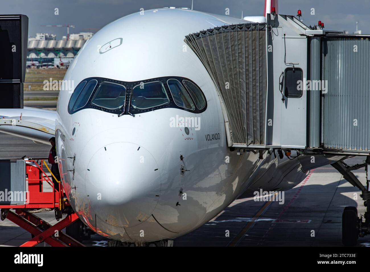 Madrid, Spain; May 31, 2023: Airbus A350-900, the new-generation wide-body aircraft of Spanish airline Iberia, parked and boarding passengers for take Stock Photo