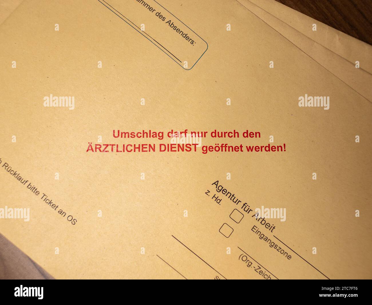 Confidentiality notice on an envelope in German language. The letter may only be opened by the medical service of the employment agency in Germany. Stock Photo