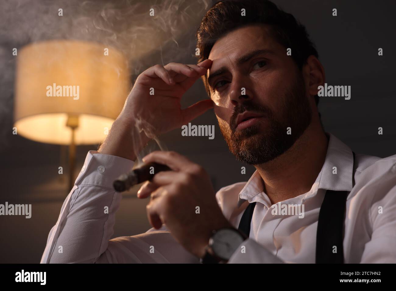 Portrait man smoking in room hi-res stock photography and images - Alamy