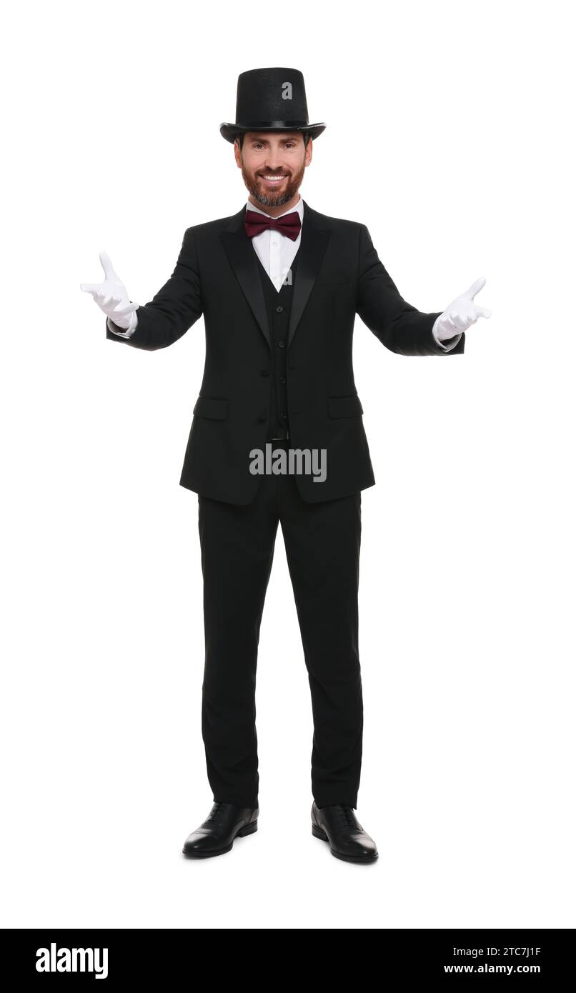 Happy magician in top hat on white background Stock Photo - Alamy