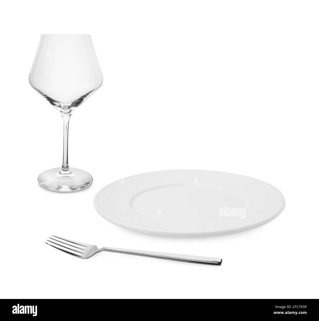 Clean plate, fork and glass on white background Stock Photo