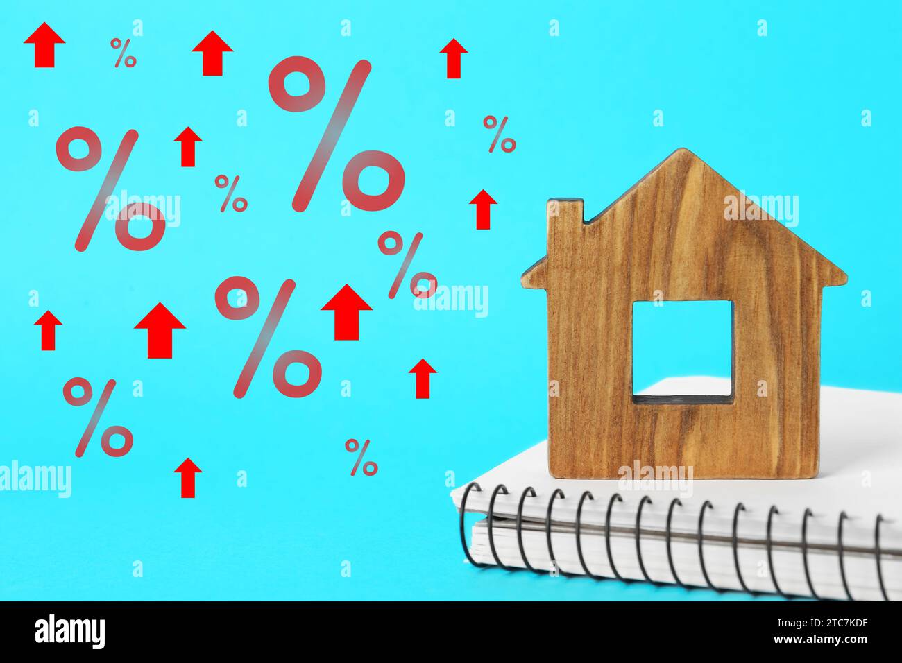 Mortgage rate rising illustrated by upward arrows and percent signs ...