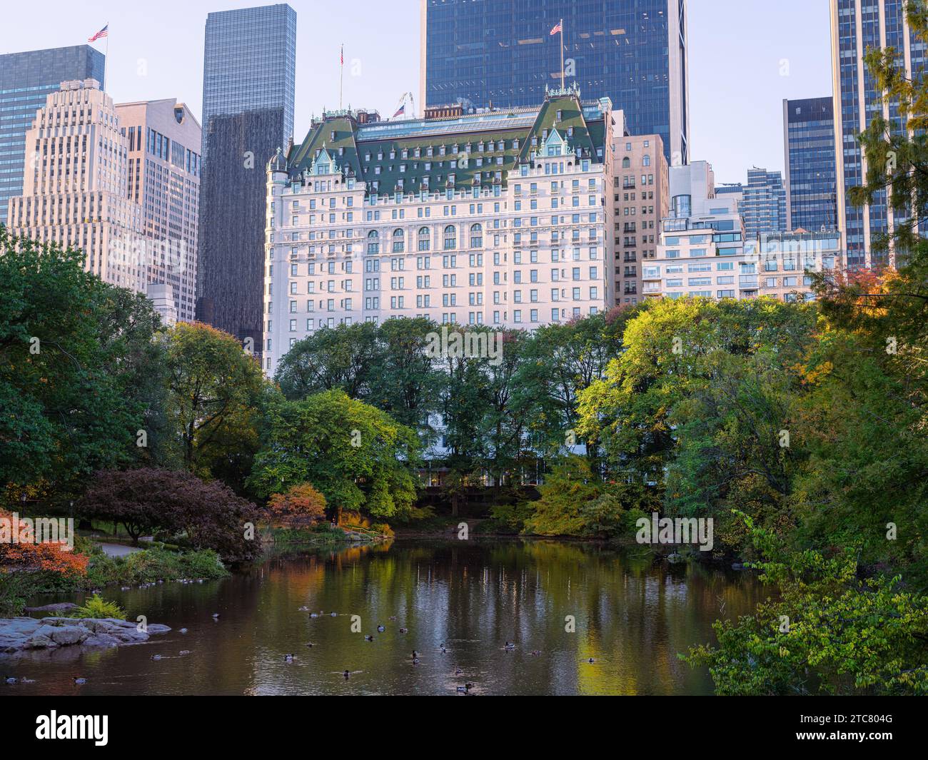 New York Plaza Hotel from The Central Park Pond in Autumn Stock Photo