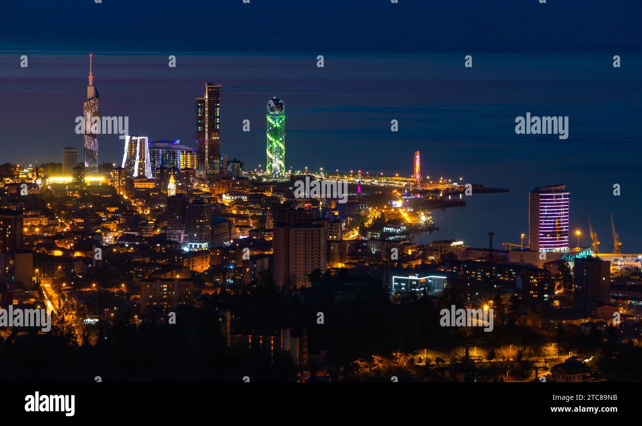 A picture of the city of Batumi at night, as seen from afar Stock Photo ...