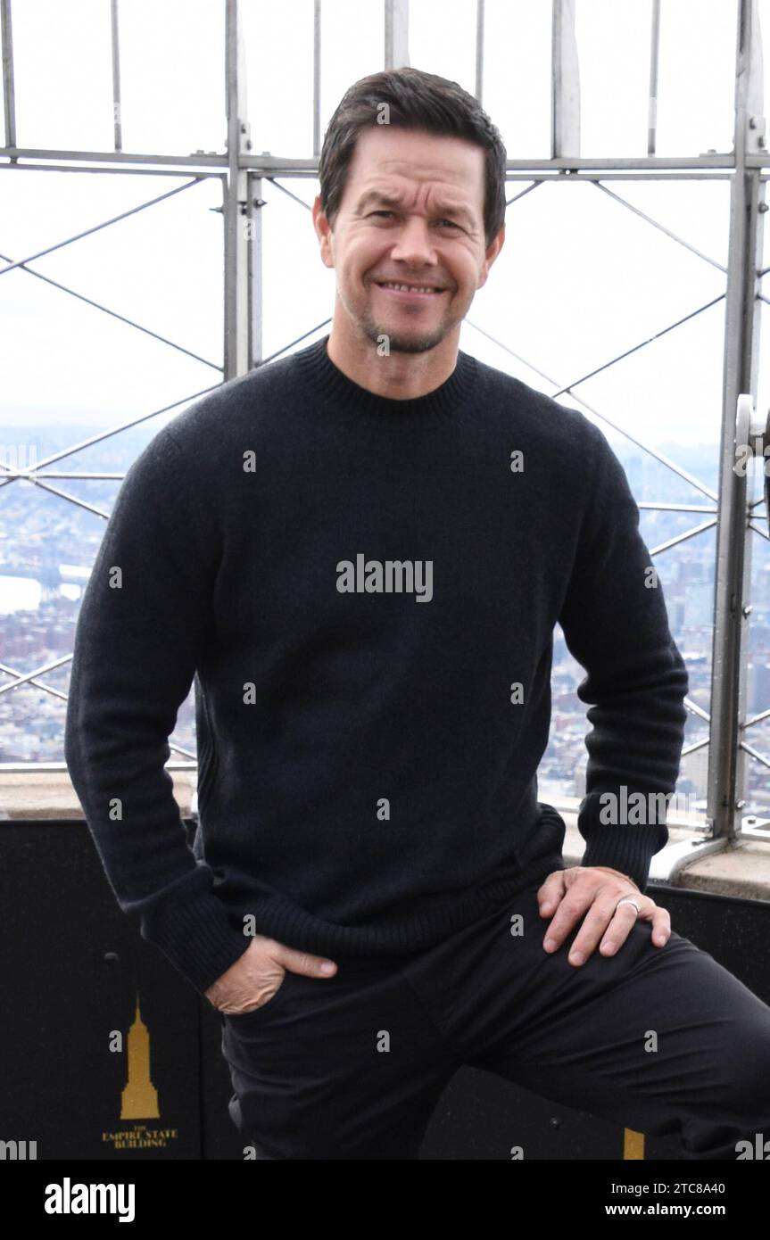 NEW YORK, NY - DECEMBER 11: Mark Wahlberg pictured as the cast of Apple TV The Family Plan promote the films premiere at the Empire State Building in New York City on December 11, 2023. Copyright: xMediaPunchx Credit: Imago/Alamy Live News Stock Photo