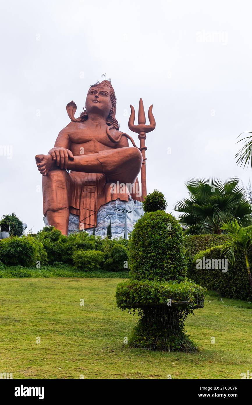 hindu god lord shiva with shivalinga isolated statue with bright