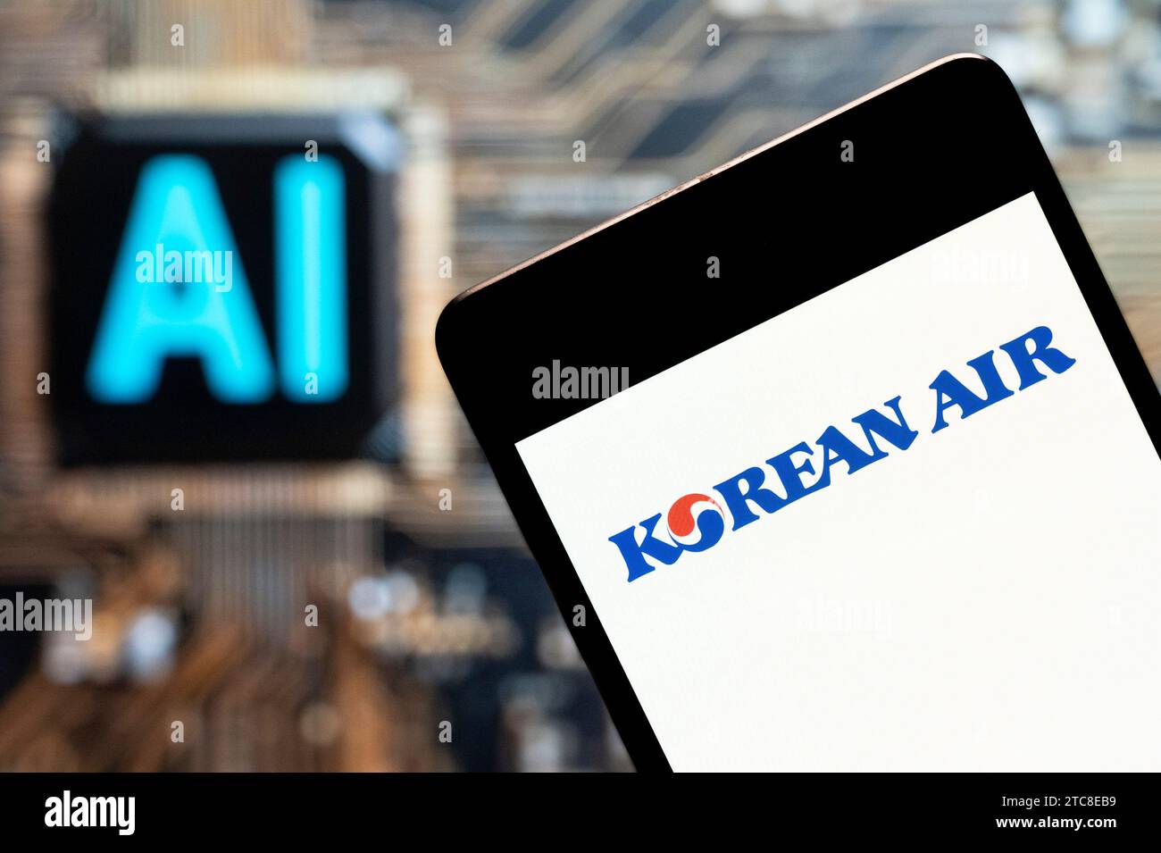 China. 03rd Nov, 2023. In this photo illustration, the largest airline and flag carrier of South Korea, Korean Air, logo seen displayed on a smartphone with an Artificial intelligence (AI) chip and symbol in the background. (Photo by Budrul Chukrut/SOPA Images/Sipa USA) *** Strictly for editorial news purposes only *** Credit: Sipa USA/Alamy Live News Stock Photo