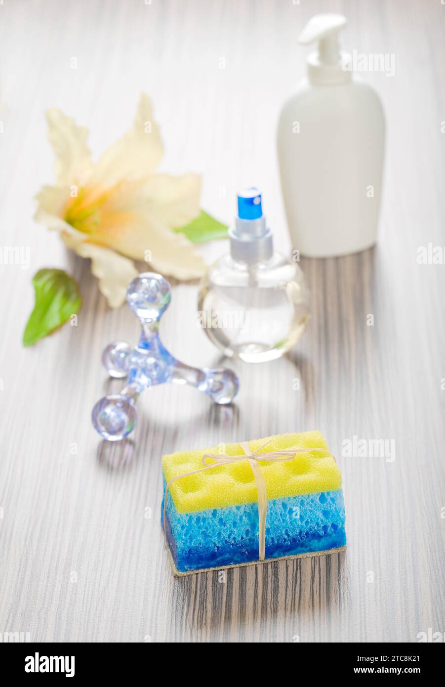 Massager bottles sponge soap and flower Stock Photo