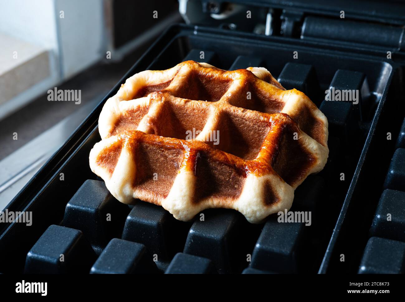 Close up of a fresh home made Belgian Liège Waffle, Brussels, Belgium Stock Photo