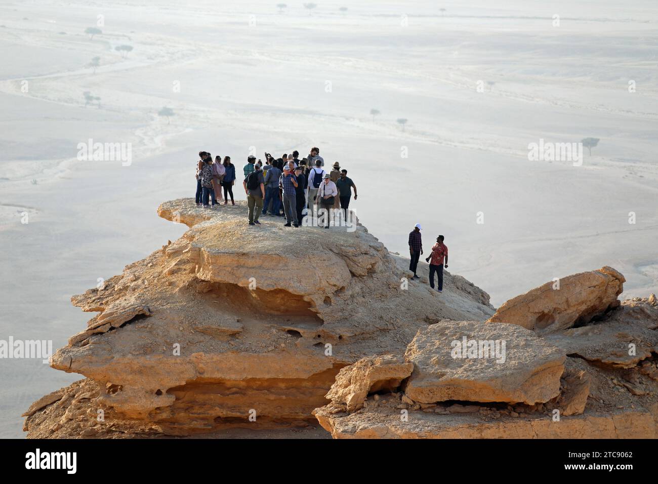 Tourists at the Edge of the World in Saudi Arabia Stock Photo