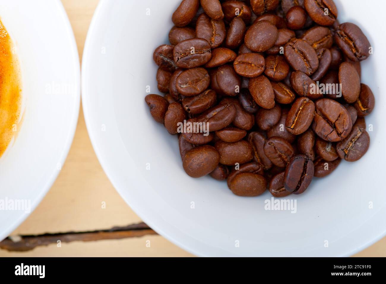 Italian espresso cofee and beans on a white wood table Stock Photo