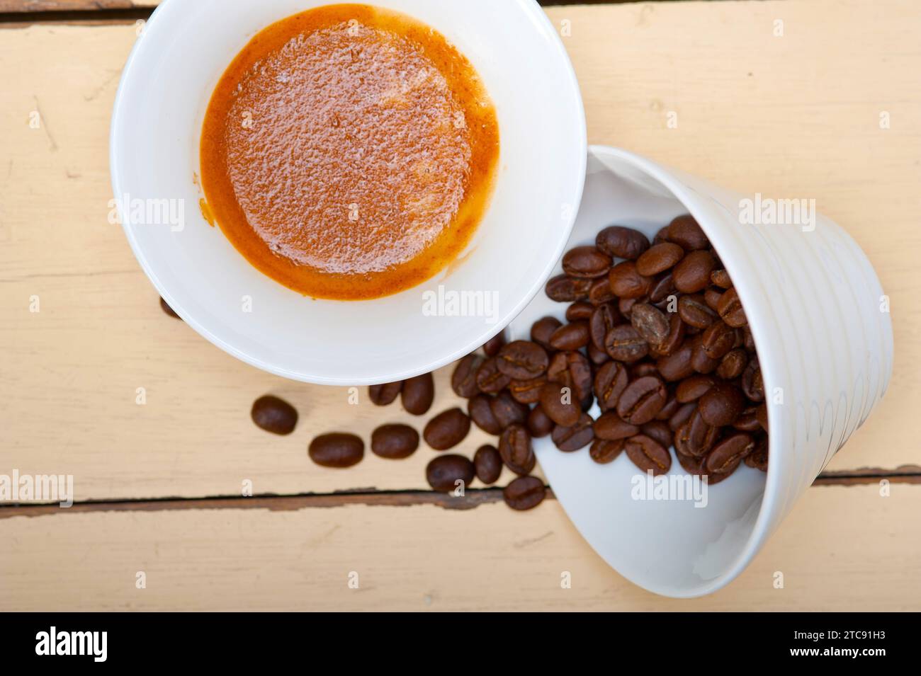 Italian espresso cofee and beans on a white wood table Stock Photo