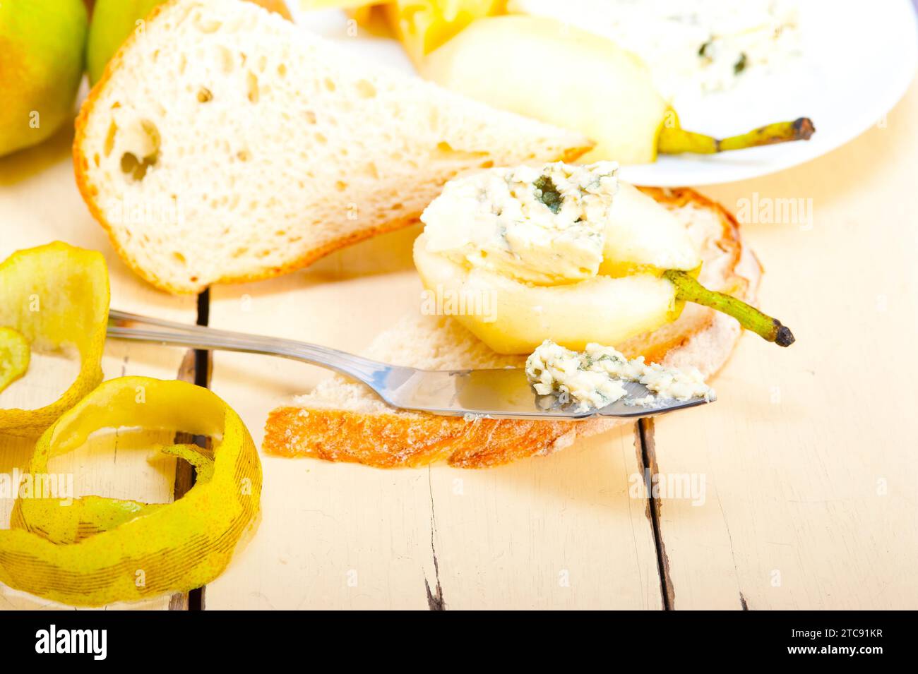 Selection of different cheese and fresh pears appetizer snack Stock Photo