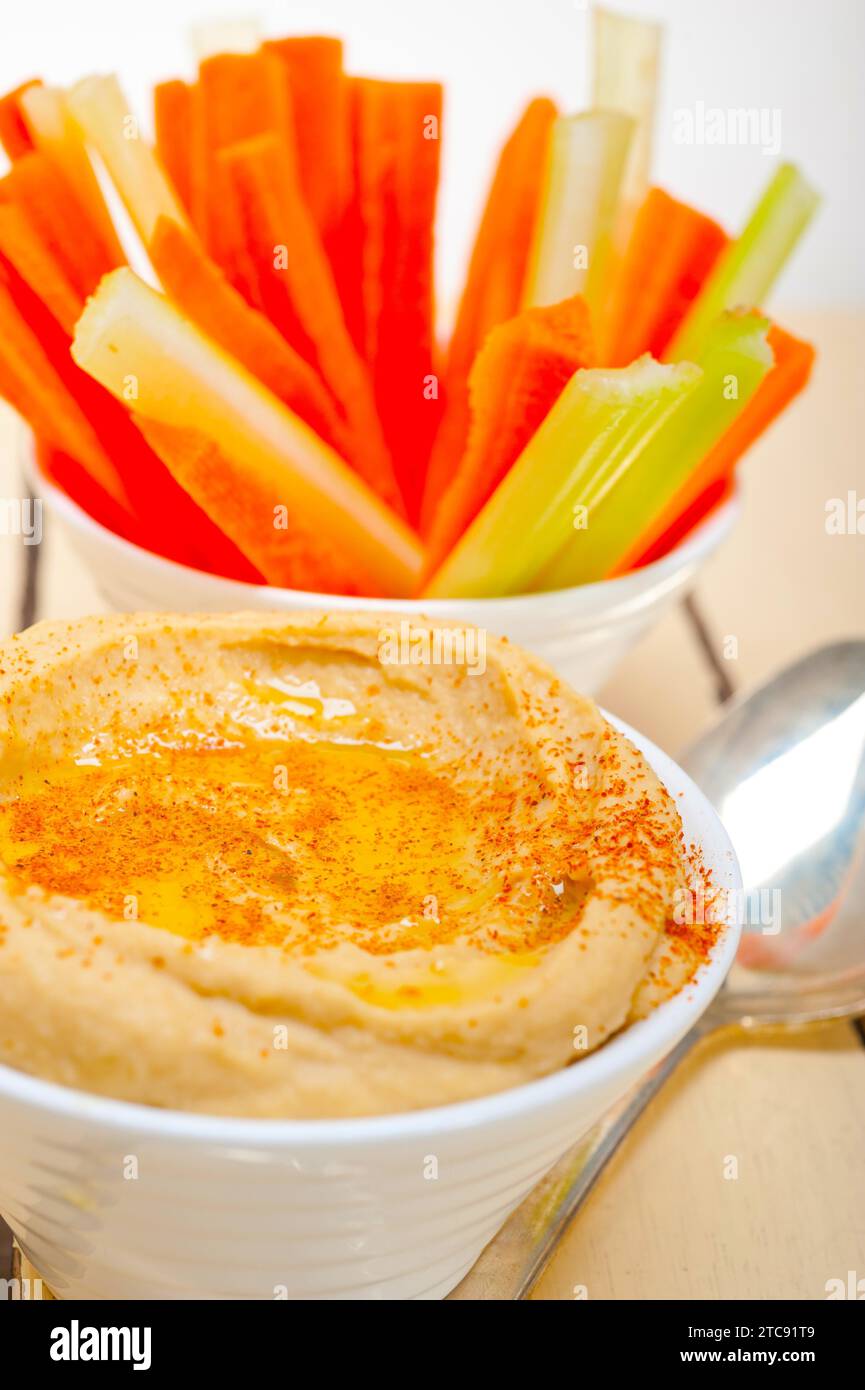 Fresh hummus dip with raw carrot and celery arab middle eastent healthy