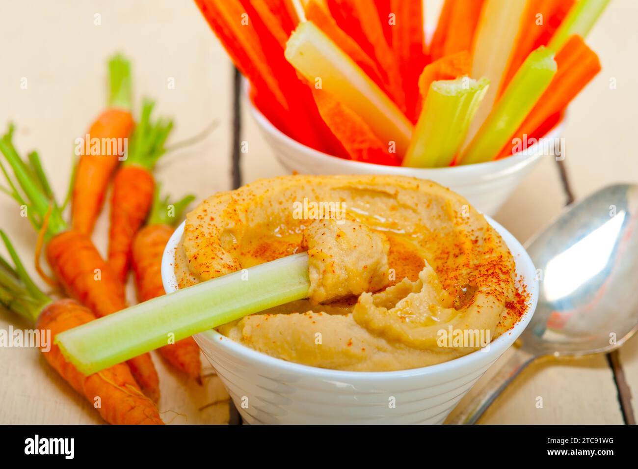 Fresh hummus dip with raw carrot and celery arab middle eastent healthy