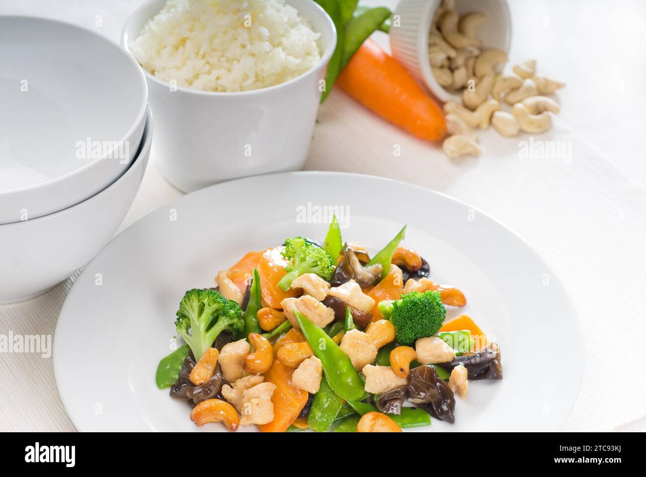 Fresh chicken and vegetables stir fried with cashew nuts, typical chinese dish Stock Photo Alamy