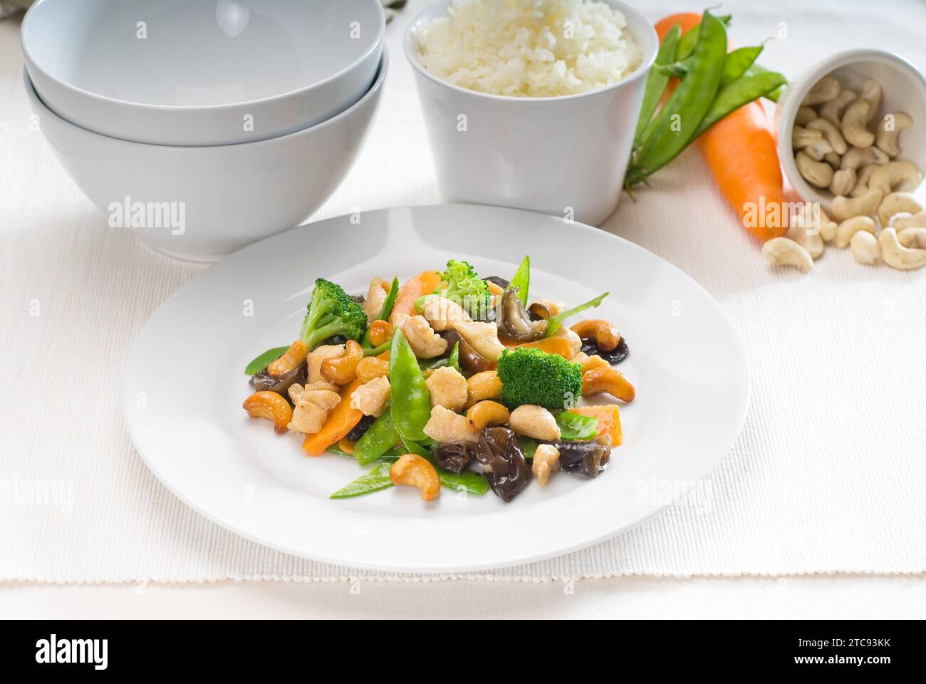 Fresh chicken and vegetables stir fried with cashew nuts, typical chinese dish Stock Photo Alamy