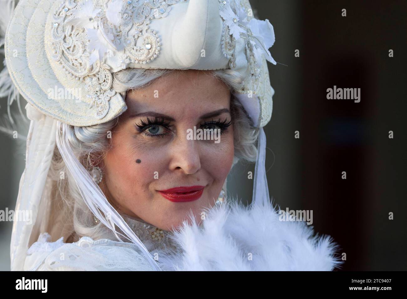 Costume wearer at the Venetian Fair, in the castle courtyard ...