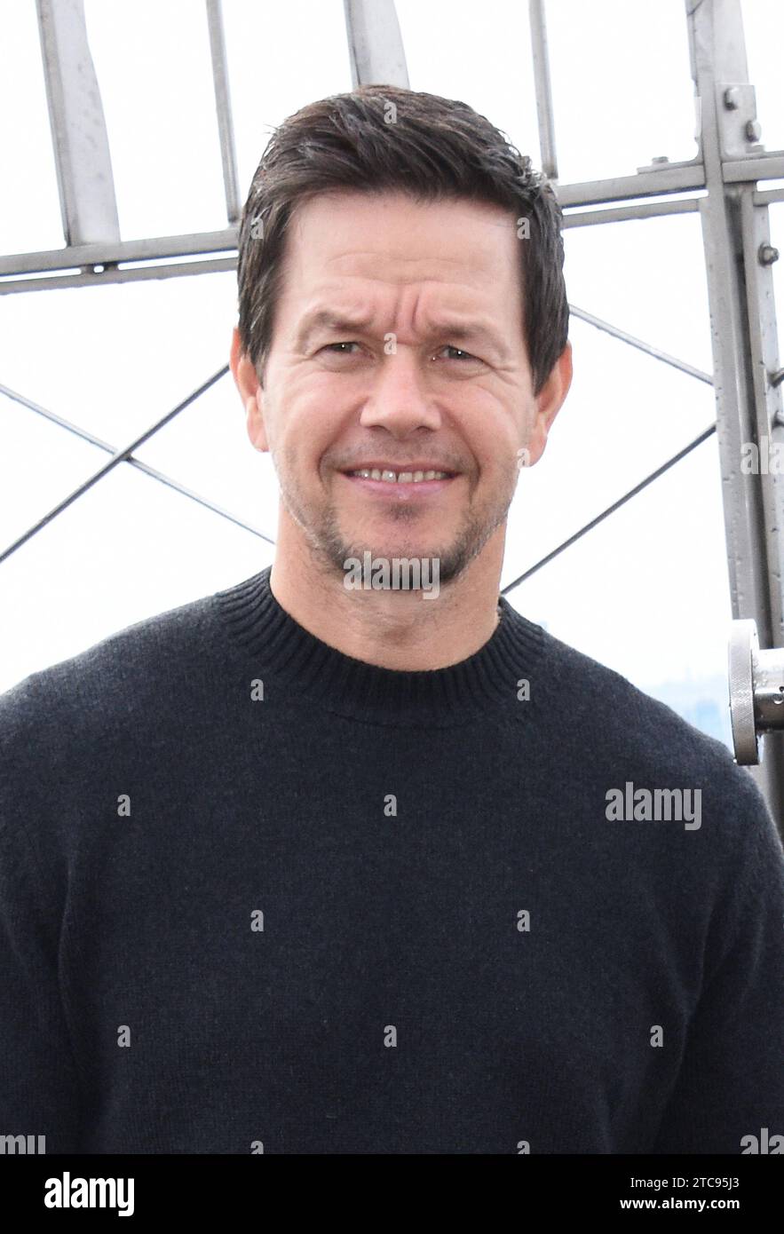 NEW YORK, NY - DECEMBER 11: Mark Wahlberg pictured as the cast of Apple TV The Family Plan promote the filmÕs premiere at the Empire State Building in New York City on December 11, 2023. Copyright: xMediaPunchx Credit: Imago/Alamy Live News Stock Photo