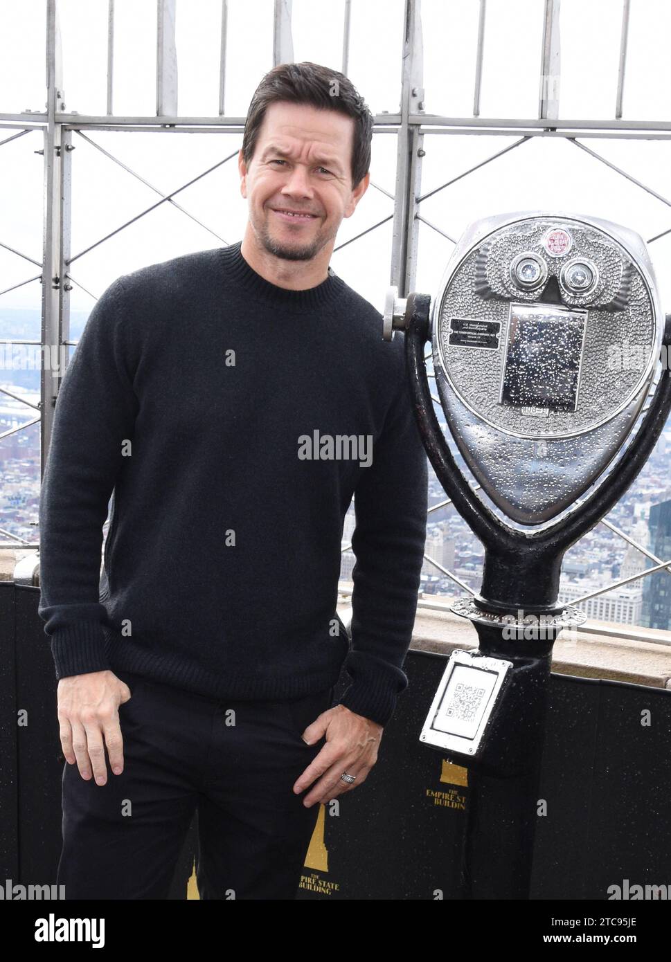 NEW YORK, NY - DECEMBER 11: Mark Wahlberg pictured as the cast of Apple TV The Family Plan promote the filmÕs premiere at the Empire State Building in New York City on December 11, 2023. Copyright: xMediaPunchx Credit: Imago/Alamy Live News Stock Photo