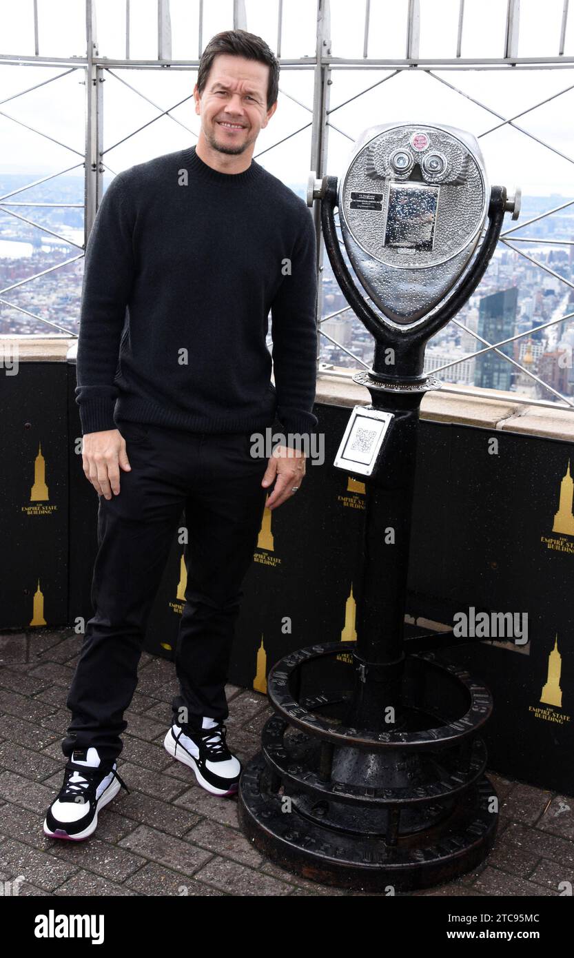 NEW YORK, NY - DECEMBER 11: Mark Wahlberg pictured as the cast of Apple TV The Family Plan promote the filmÕs premiere at the Empire State Building in New York City on December 11, 2023. Copyright: xMediaPunchx Credit: Imago/Alamy Live News Stock Photo